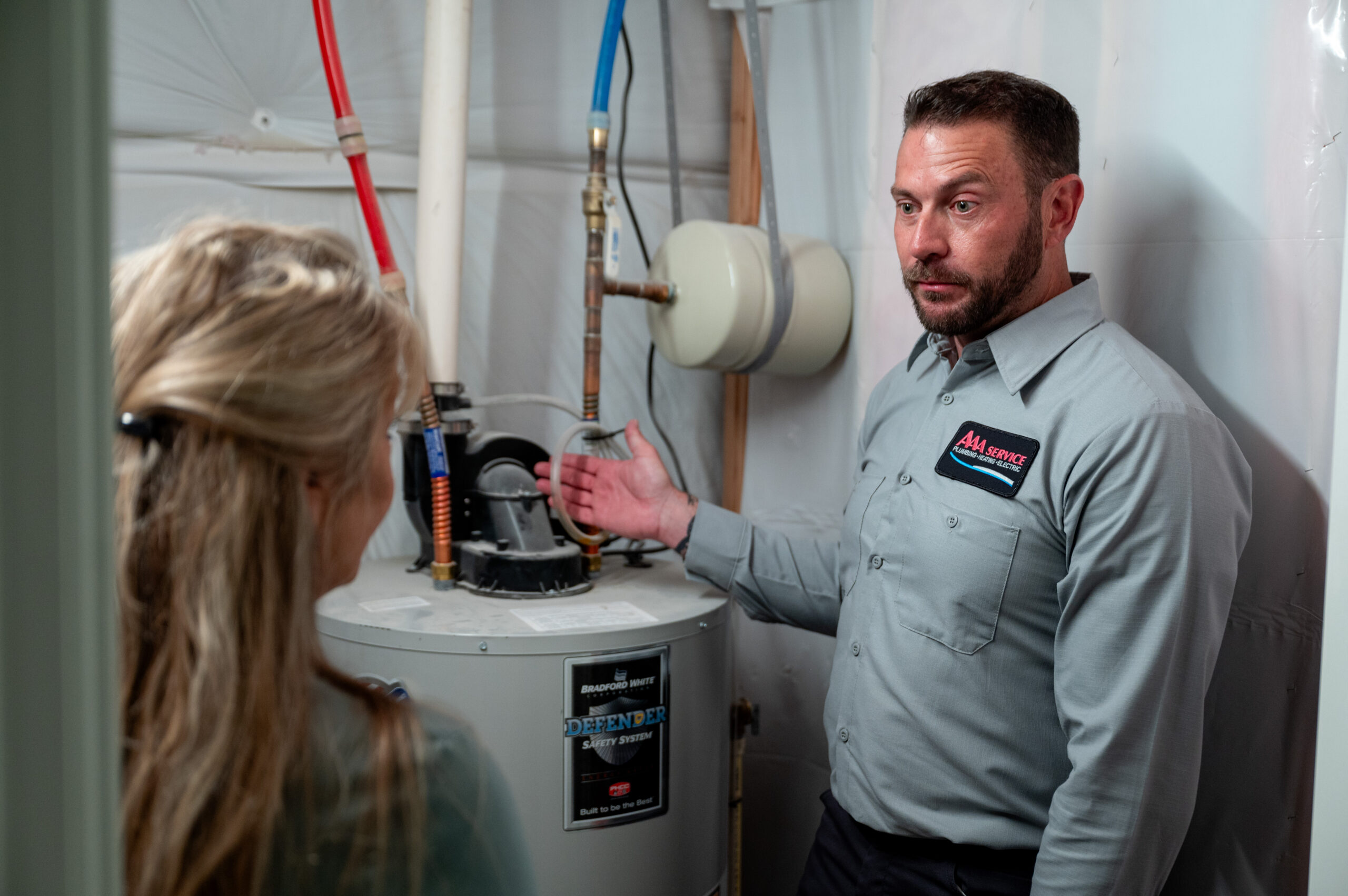 HVAC tech installing furnace.